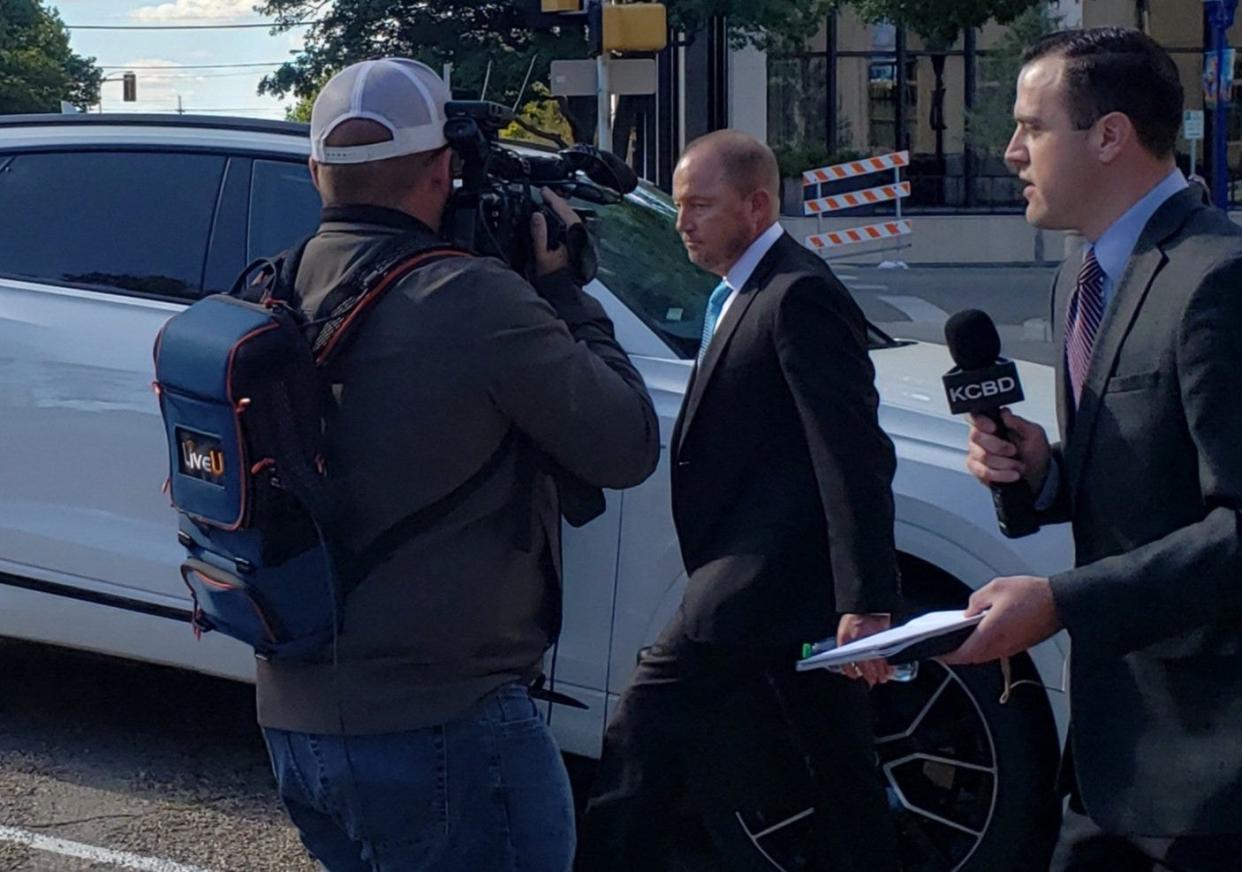 Bart Reagor leaves the federal courthouse in Amarillo Friday afternoon after being found guilty on one of three counts he was charged with in connection to bank fraud.