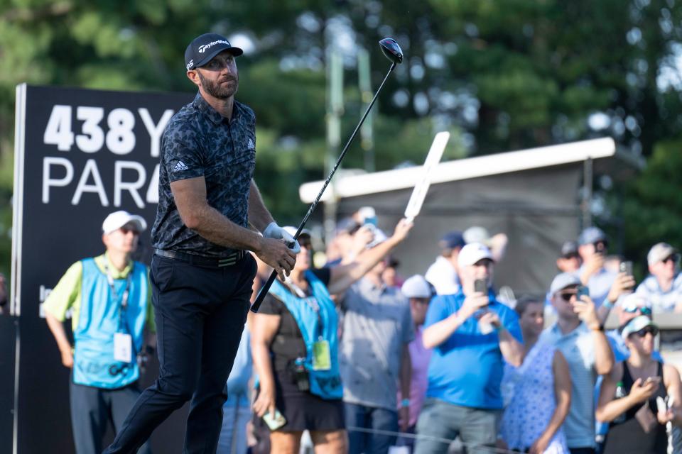 Dustin Johnson watches his ball after hitting a tee shot on the 16th during the second round of the LIV Golf tournament at The International.