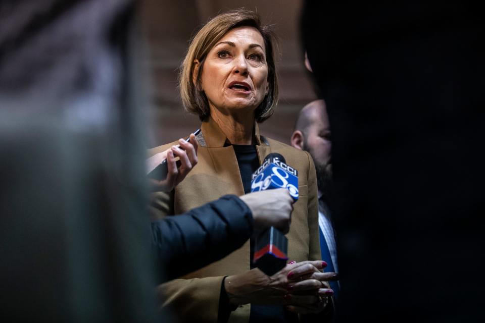 Gov. Kim Reynolds talks to the press after speaking at the Build My Future skilled trade letter of intent signing ceremony, on Wednesday, April 13, 2022, in the Varied Industries Building at the Iowa State Fairgrounds, in Des Moines.   