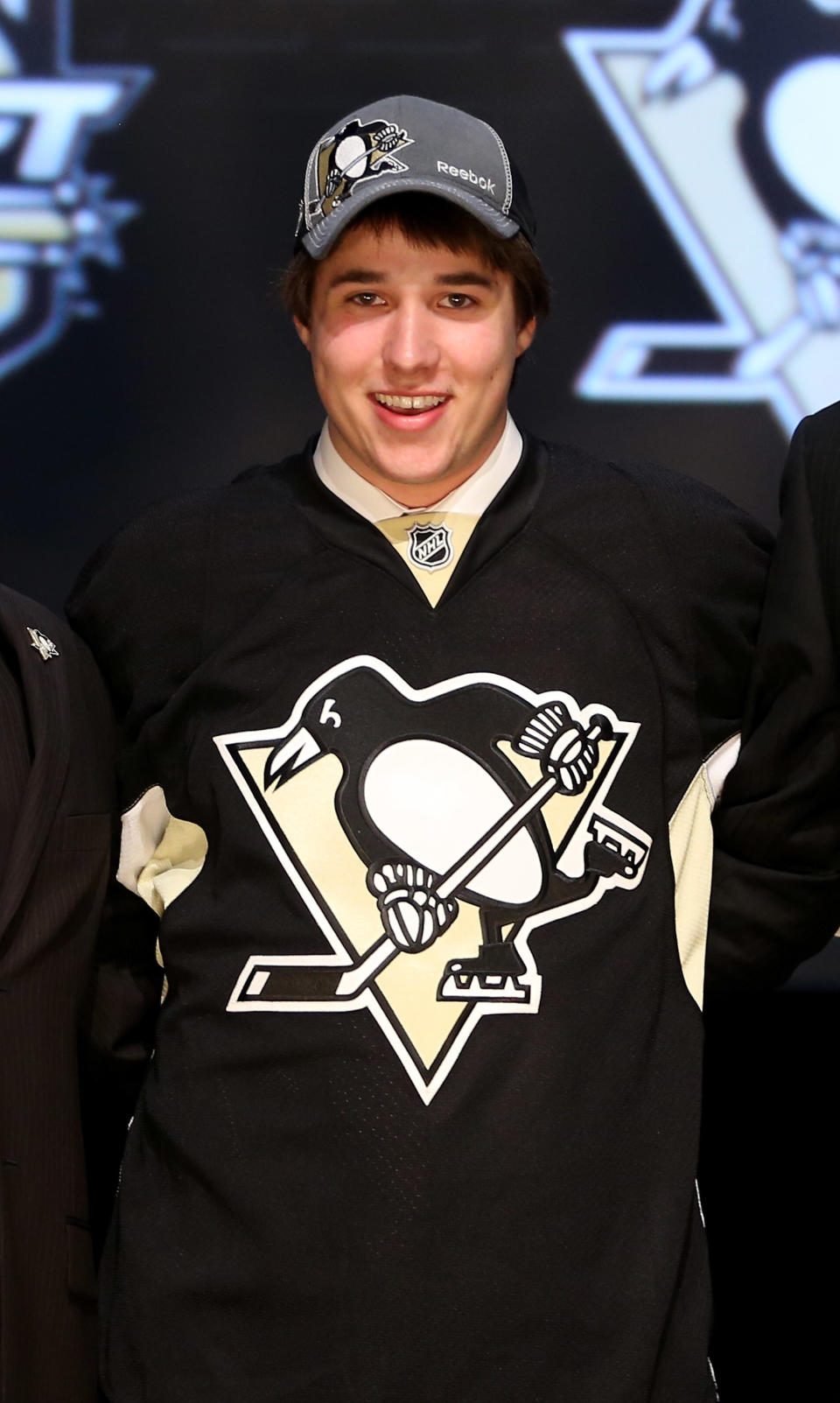 PITTSBURGH, PA - JUNE 22: Derrick Pouliot, eighth overall pick by the Pittsburgh Penguins, poses on stage during Round One of the 2012 NHL Entry Draft at Consol Energy Center on June 22, 2012 in Pittsburgh, Pennsylvania. (Photo by Bruce Bennett/Getty Images)