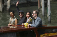 File - Actors Ruth Negga, from left, Brad Pitt, Liv Tyler and director James Gray arrive for the photo call of 'Ad Astra' at the Venice Film Festival. The 77th Venice Film Festival will kick off on Wednesday, Sept. 2, 2020, but this year's edition will be unlike any others. Coronavirus restrictions will mean fewer Hollywood stars, no crowds interacting with actors and other virus safeguards will be deployed. (AP Photo/Dejan Jankovic, File)