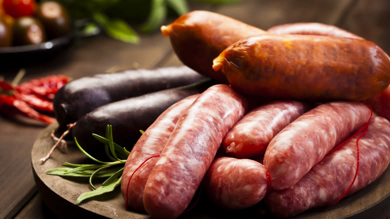 Plate of raw sausages