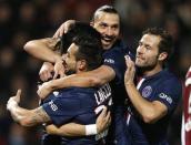 Paris St Germain's Javier Pastore (L) celebrates his goal against Metz with his team mates (2nd L to R) Ezequiel Lavezzi, Zlatan Ibrahimovic and Yohan Cabaye during their French Ligue 1 soccer match at the Saint Symphorien stadium in Metz November 21, 2014. REUTERS/Vincent Kessler