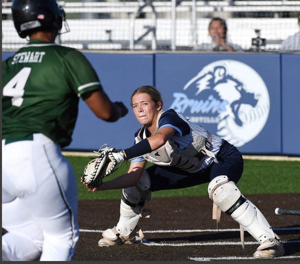 Bartlesviille High catcher Parker Fielder looks to apply a tag during fastpitch softball action on Aug. 14, 2023, in Bartlesville.