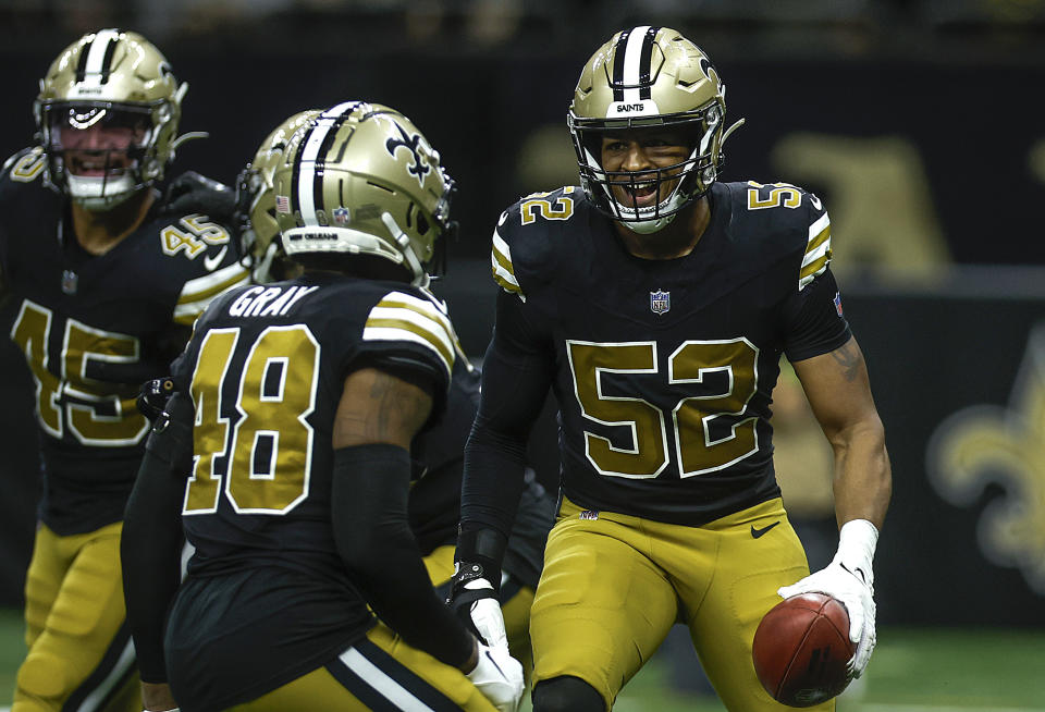 NEW ORLEANS, LOUISIANA – DECEMBER 10: D’Marco Jackson #52 of the New Orleans Saints celebrates a touchdown with teammates during the second quarter against the Carolina Panthers at Caesars Superdome on December 10, 2023 in New Orleans, Louisiana. (Photo by Chris Graythen/Getty Images)