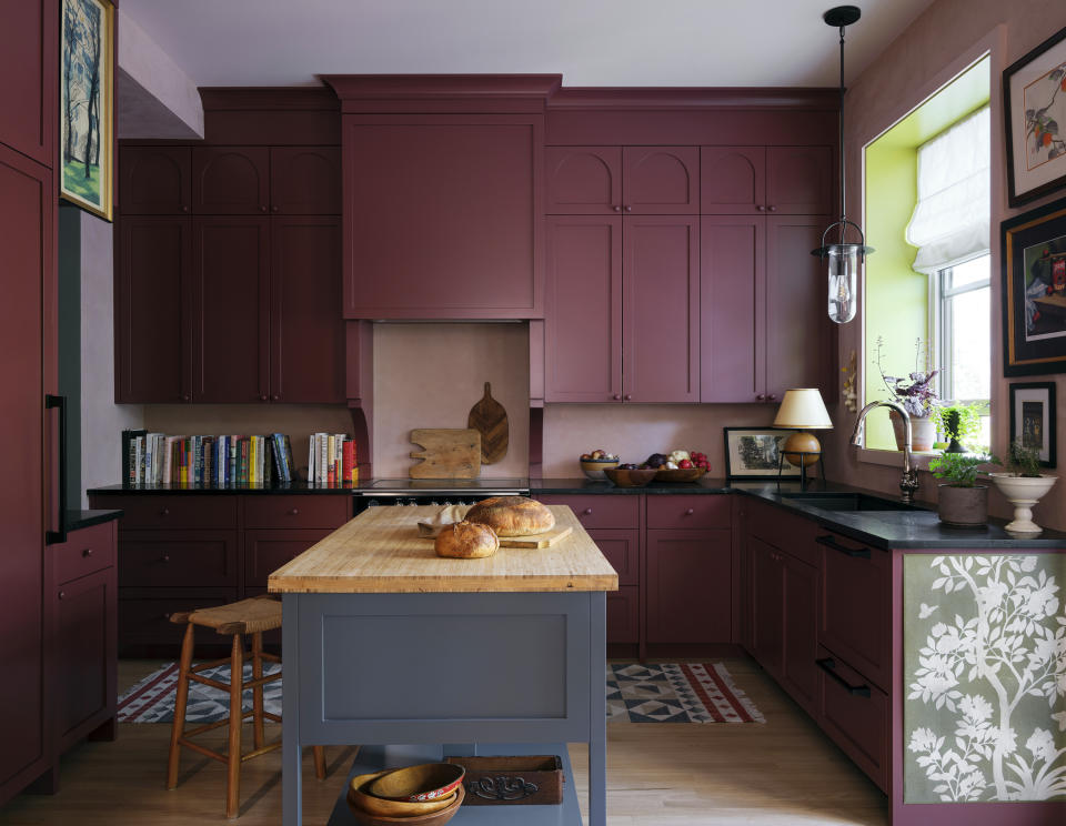 This photo shows designer and "Uncommon Kitchens" author Sophie Donelson’s homey, colorful Montreal kitchen. Donelson and other design experts say that with a measure of color, pattern and/or décor elements, we can all have a kitchen that serves up happy. (Patrick Biller s via AP)