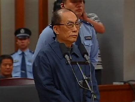 China's former railways minister, Liu Zhijun, attends a trial for charges of corruption and abuse of power at a courthouse in Beijing, in this file still image taken from video dated June 9, 2013. China has taken steps to curb graft in public procurement. But industry officials and analysts say the process is still riddled with graft partly because China's rapid economic growth has fuelled a surge in fixed asset investment by the government and state firms that have often escaped proper oversight. They say officials at state firms involved in tendering often accept bribes to award contracts or select companies run by relatives or friends. Irregularities include splitting a major project into pieces to dodge the tender process, they add. One recent example was former railways minister Liu Zhijun, who was given a suspended death sentence this year for graft. Liu was found to have helped 11 people win railway contracts or get promotions in return for 64.6 million yuan in bribes between 1986 and 2011, official media said. To match story CHINA-PROCUREMENT/ REUTERS/CCTV via Reuters TV/Files (CHINA - Tags: POLITICS CRIME LAW TRANSPORT) ATTENTION EDITORS - THIS IMAGE WAS PROVIDED BY A THIRD PARTY. THIS PICTURE IS DISTRIBUTED EXACTLY AS RECEIVED BY REUTERS, AS A SERVICE TO CLIENTS THIS IMAGE HAS BEEN SUPPLIED BY A THIRD PARTY. IT IS DISTRIBUTED, EXACTLY AS RECEIVED BY REUTERS, AS A SERVICE TO CLIENTS. CHINA OUT. NO COMMERCIAL OR EDITORIAL SALES IN CHINA