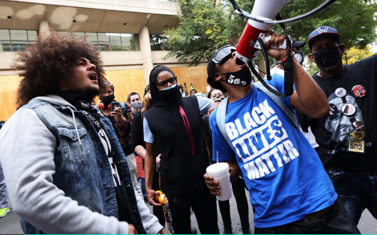 Demonstrators demand the release of those arrested during protests in Kentucky - Michael M. Santiago /Getty Images North America 