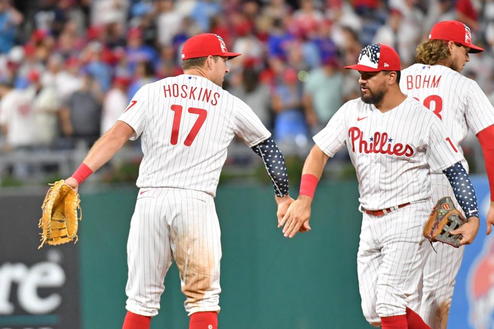 Philadelphia Phillies first baseman Rhys Hoskins celebrates a win with left fielder Kyle Schwarber (12) against the St. Louis Cardinals at Citizens Bank Park in Philadelphia on July 3.