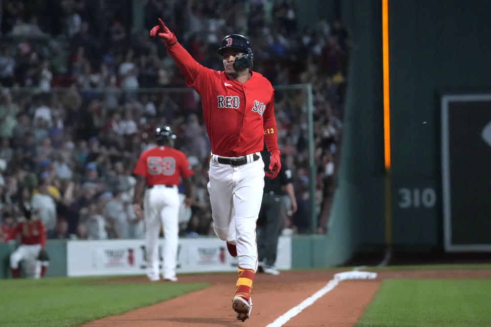 CORRECTS TO FIRST INNING, INSTEAD OF SECOND - Boston Red Sox's Ceddanne Rafaela gestures as he nears the plate on a home run against the New York Yankees during the first inning of the second game of a baseball doubleheader Tuesday, Sept. 12, 2023, in Boston. (AP Photo/Steven Senne)