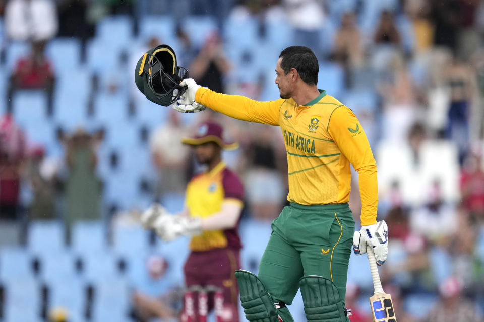 South Africa's Quinton de Kock celebrates his century during the second T20 cricket match between South Africa and West Indies, at Centurion Park, in Pretoria, South Africa, Sunday, March 26, 2023. (AP Photo/Themba Hadebe)