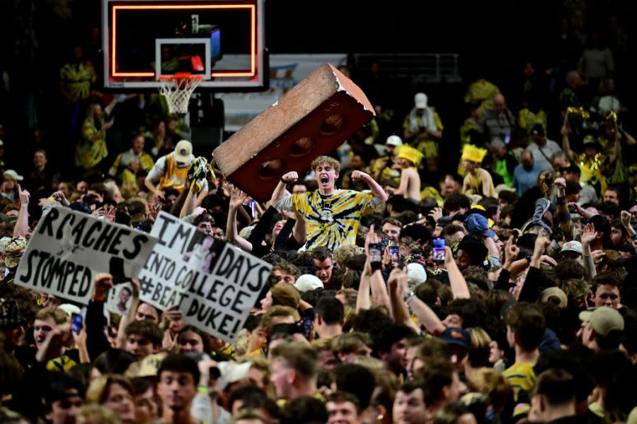 WINSTON SALEM, NORTH CAROLINA – FEBRUARY 24: Wake Forest Demon Deacons fans storm the court after a win Duke Blue Devils at Lawrence Joel Veterans Memorial Coliseum on February 24, 2024 in Winston Salem, North Carolina. Wake Forest won 83-79. (Photo by Grant Halverson/Getty Images)