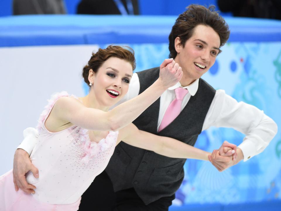 Alexandra Paul and Mitchell Islam of Canada perform in the ice dance short program during the Sochi Olympic Winter Games in 2014.