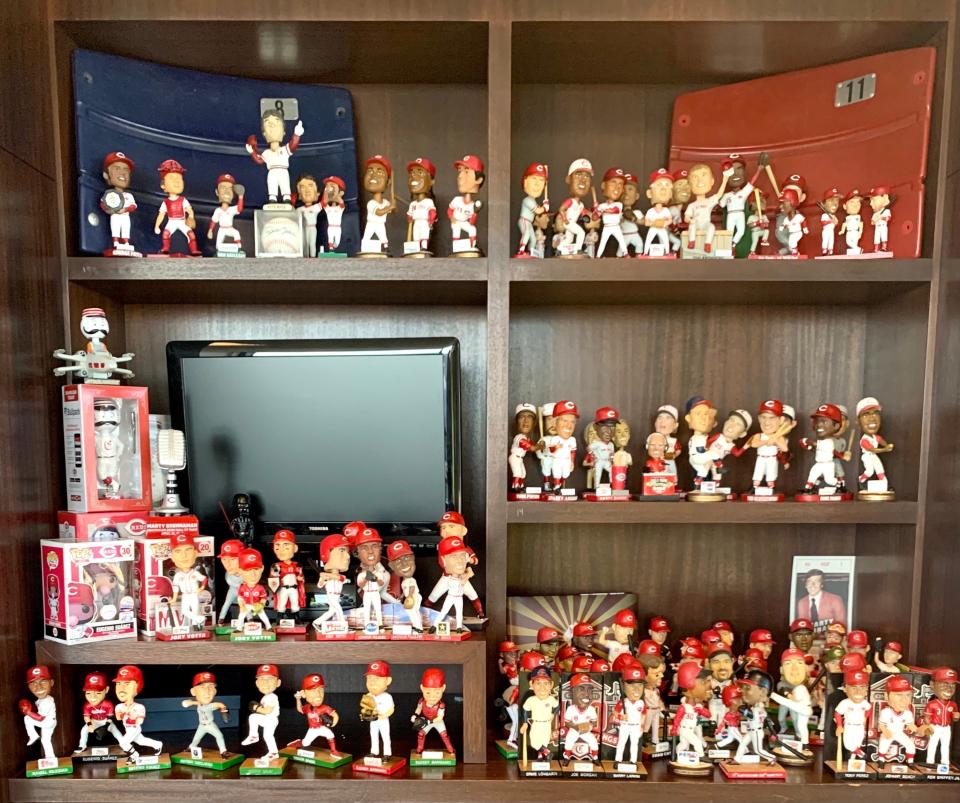 Some of the Reds bobbleheads in Enquirer Editor Beryl Love's collection.