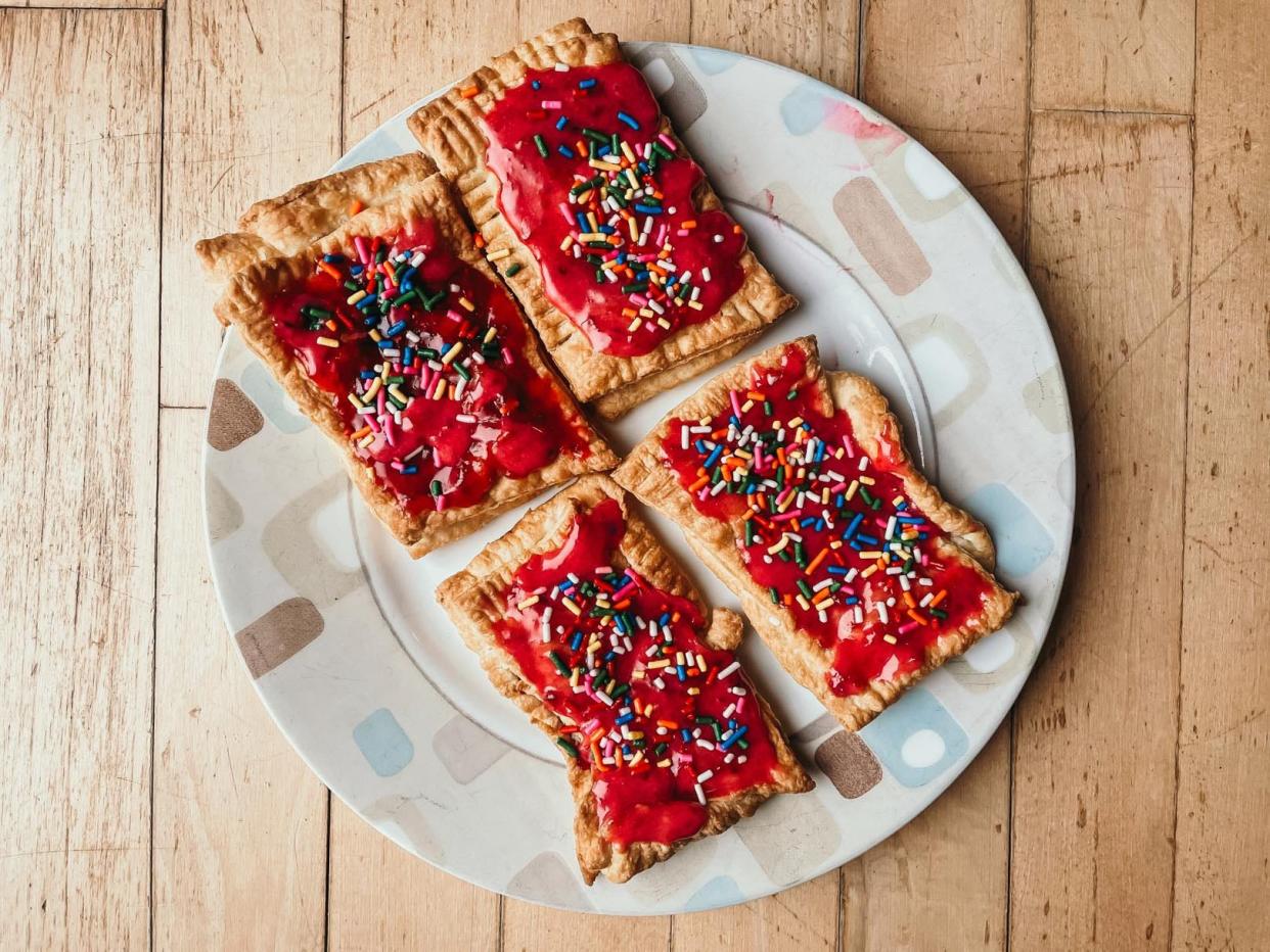 four berry toaster pastries on a plate