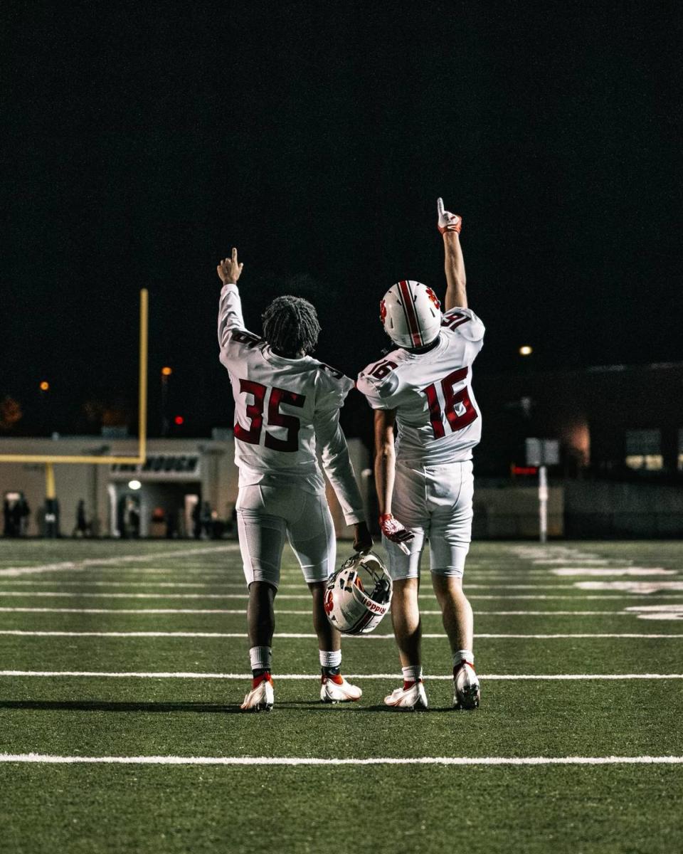 16-year-old Keith Austin pictured on the field with a fellow teammate.