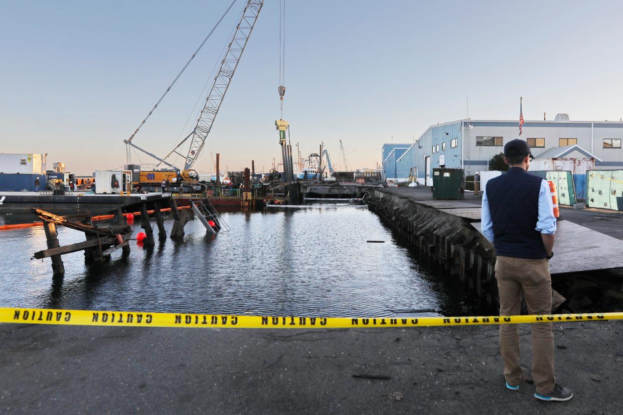 This file photo was taken after the initial partial collapse of Eastern Fisheries' dock in New Bedford back in October. According to New Bedford Police Department, police responded to another collapse involving Eastern Fisheries' dock this past Friday.