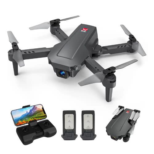 black drone with camera and accessories