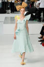 <p><i>Model wears a yellow-and-light-blue ruffled dress from the SS18 Delpozo collection. (Photo: IMAXtree) </i></p>