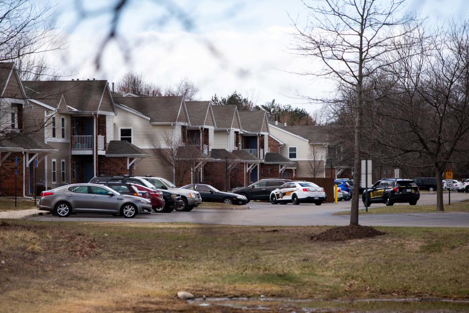 Falcon Woods Apartments sits under lockdown as police search for a potential shooting suspect Monday, March 28, 2022, in Holland Township.