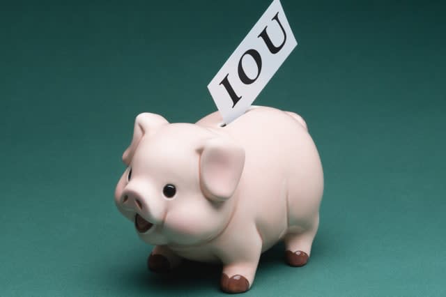 Piggy bank with IOU