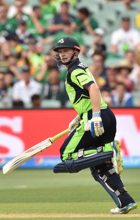 Ireland captain William Porterfield run to score his century during the Cricket World Cup match against Pakistan at the Adelaide Oval on March 15, 2015