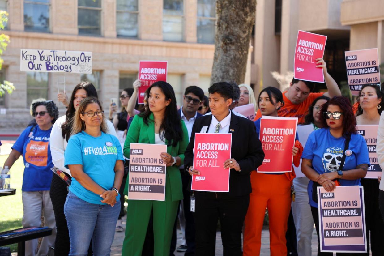 <span>Abortion rights activists in Phoenix, Arizona, on 17 April 2024.</span><span>Photograph: Liliana Salgado/Reuters</span>