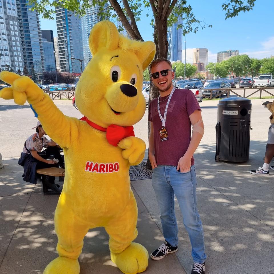 The author posing with someone in. Haribo gummy bear costume