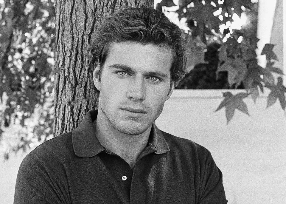 FILE - In this Nov. 12, 1982, file photo, actor Jon-Erik Hexum poses for a picture. In 1984, Hexum died after shooting himself in the head with a prop gun blank while pretending to play Russian roulette with a .44 Magnum on the set of the television series “Cover Up.” Court records show that an assistant director unwittingly handed Alec Baldwin a loaded weapon and told him it was safe to use in the moments before the actor fatally shot a cinematographer on the set of a Western, Thursday, Oct. 21, 2021. (AP Photo/Wally Fong, File)