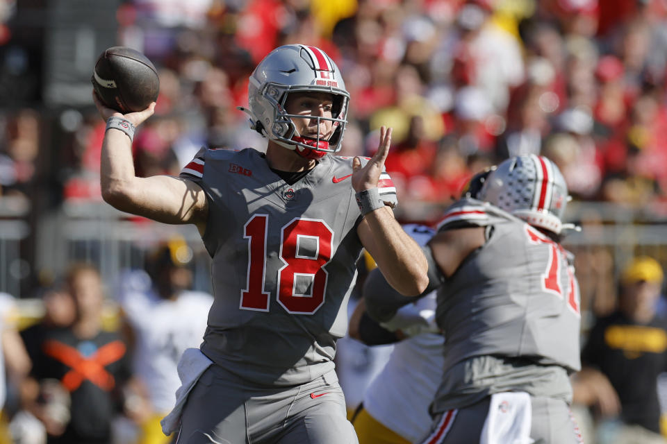 Ohio State quarterback Will Howard throws a pass against Iowa during the first half of an NCAA college football game, Saturday, Oct. 5, 2024, in Columbus, Ohio. (AP Photo/Jay LaPrete)