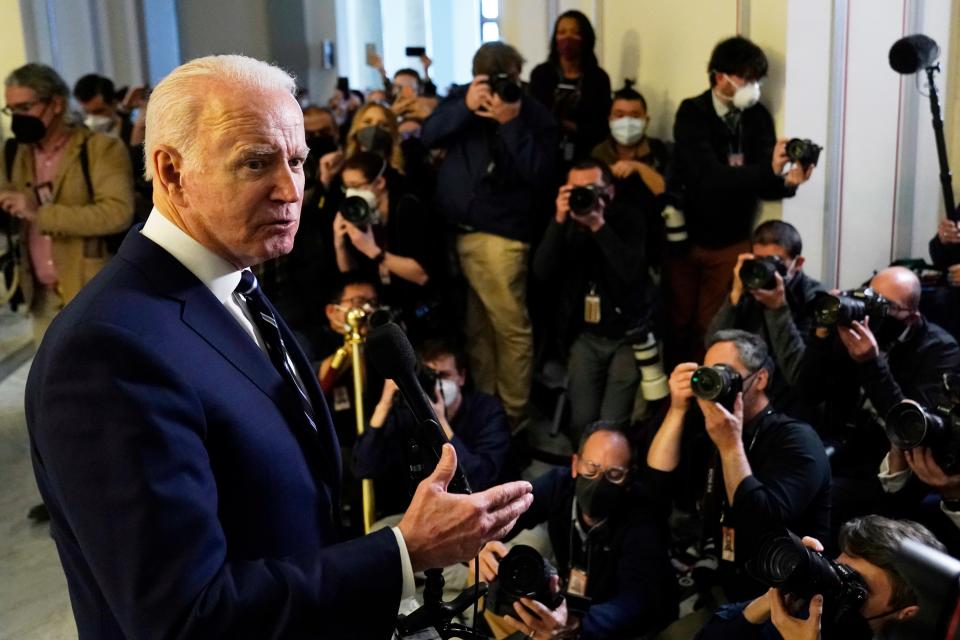 President Joe Biden speaks to the media after meeting privately with Senate Democrats, Thursday, Jan. 13, 2022, on Capitol Hill in Washington.