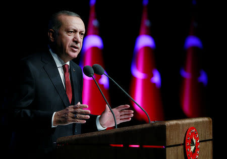 FILE PHOTO: Turkish President Tayyip Erdogan speaks during a meeting in Ankara, Turkey December 13, 2018. Murat Cetinmuhurdar/Presidential Press Office/Handout via REUTERS/File Photo