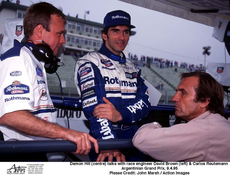 FILE PHOTO: Damon Hill (centre) talks with race engineer David Brown (left) & Carlos Reutemann