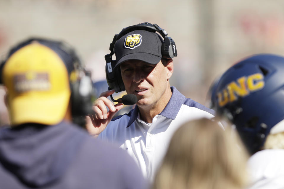 Northern Colorado head coach Ed Lamb, center, stands on the sideline during the first half of an NCAA college football game against Washington State, Saturday, Sept. 16, 2023, in Pullman, Wash. (AP Photo/Young Kwak)