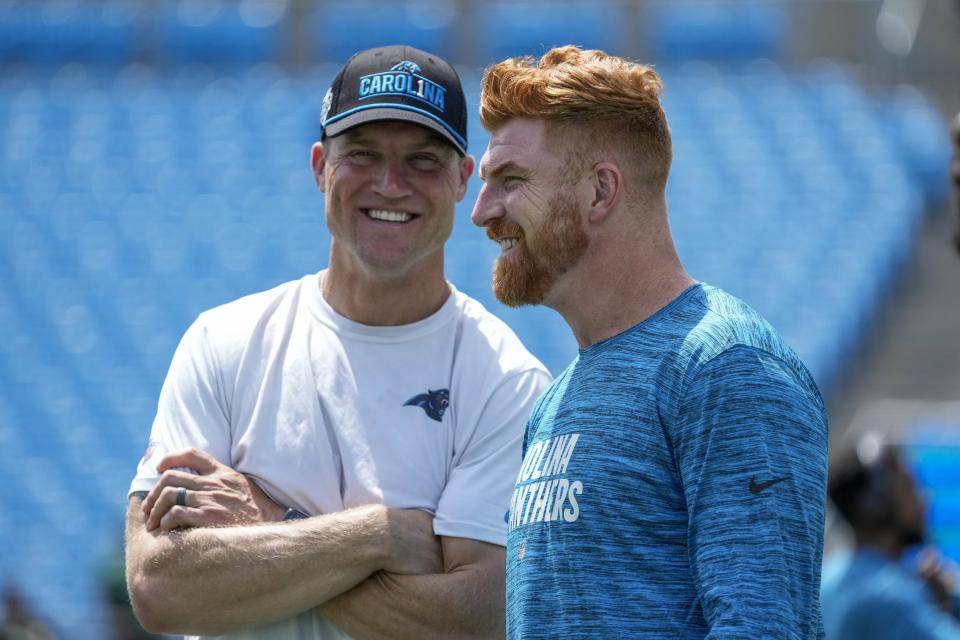 Aug 12, 2023; Charlotte, North Carolina, USA; quarterback coach Josh McCown and Carolina Panthers quarterback <a class="link " href="https://sports.yahoo.com/nfl/players/24822" data-i13n="sec:content-canvas;subsec:anchor_text;elm:context_link" data-ylk="slk:Andy Dalton;sec:content-canvas;subsec:anchor_text;elm:context_link;itc:0">Andy Dalton</a> (14) during pre game warm ups against the New York Jets at Bank of America Stadium. Mandatory Credit: Jim Dedmon-USA TODAY Sports