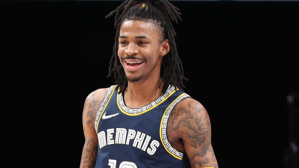 Ja Morant was all smiles after dropping a career-high 52 points against the San Antonio Spurs. (Photo by Joe Murphy/NBAE via Getty Images)