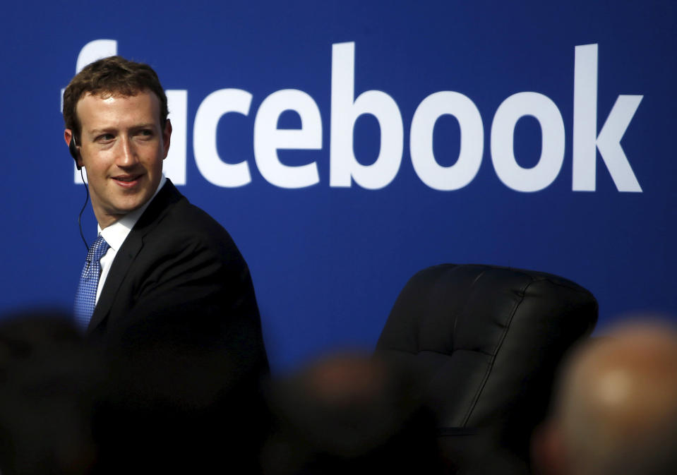 Facebook CEO Mark Zuckerberg is seen on stage during a town hall at Facebook's headquarters in Menlo Park, California September 27, 2015. Picture taken February 27, 2015. REUTERS/Stephen Lam/File Photo