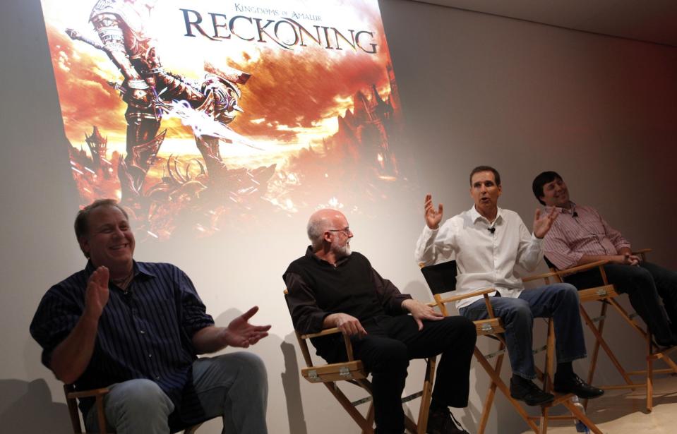 Schilling, far left, in 2011 talking at a panel for his game, 