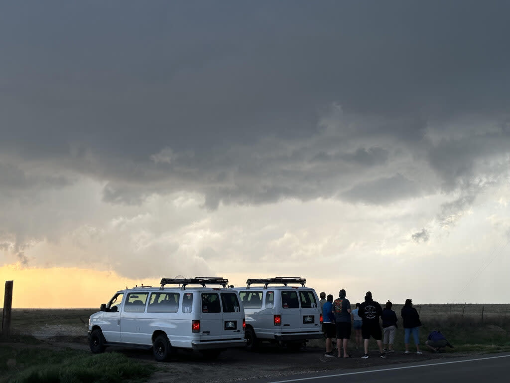 Storm chasers watch rotating clouds hovering over Gove and Ness counties May 1 in western Kansas. This year's number of tornadoes in the state is now at 40