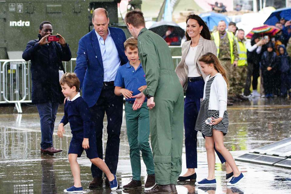 <p>Ben Birchall/PA Images via Getty Images</p> Prince William, Kate Middleton, Prince George, Princess Charlotte and Prince Louis visit the Royal International Air Tattoo (RIAT) at RAF Fairford, Gloucestershire. 