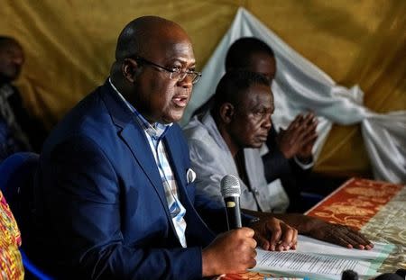 FILE PHOTO: Felix Tshisekedi, leader of Congolese main opposition the Union for Democracy and Social Progress (UDPS) party, addresses a news conference in Limete Municipality of Kinshasa, Democratic Republic of Congo October 12, 2017. REUTERS/Robert Carrubba