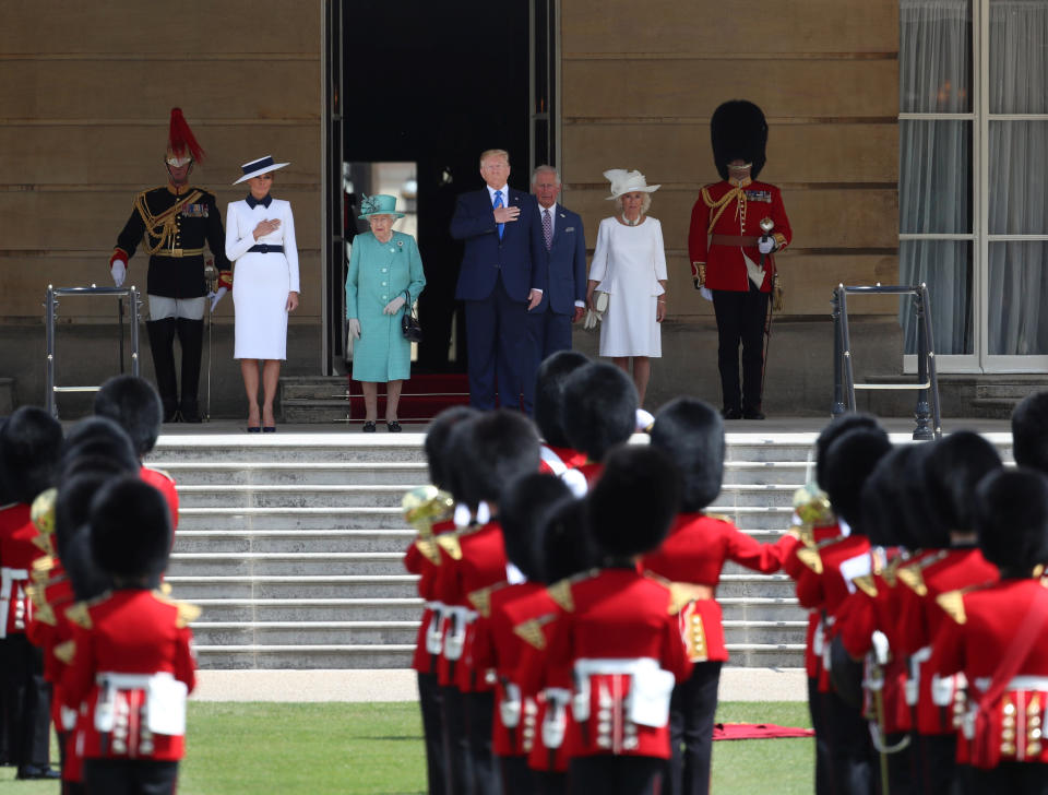 (Left to right) First Lady Melania Trump, Queen Elizabeth II, US President Donald Trump, The Prince of Wales and Duchess of Cornwall inspect the Guard of Honour during a Ceremonial Welcome at Buckingham Palace, London, on day one of his three day state visit to the UK.