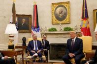 FILE PHOTO: U.S. President Donald Trump meets with Iraq's Prime Minister Mustafa al-Kadhimi in the Oval Office at the White House in Washington