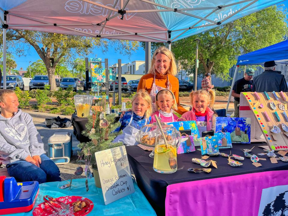 Former Daytona Beach City Commissioner Kelly White and her triplets took part in last year's Children's Business Fair in downtown Daytona. The little girls sold key limeade and orange cookies.