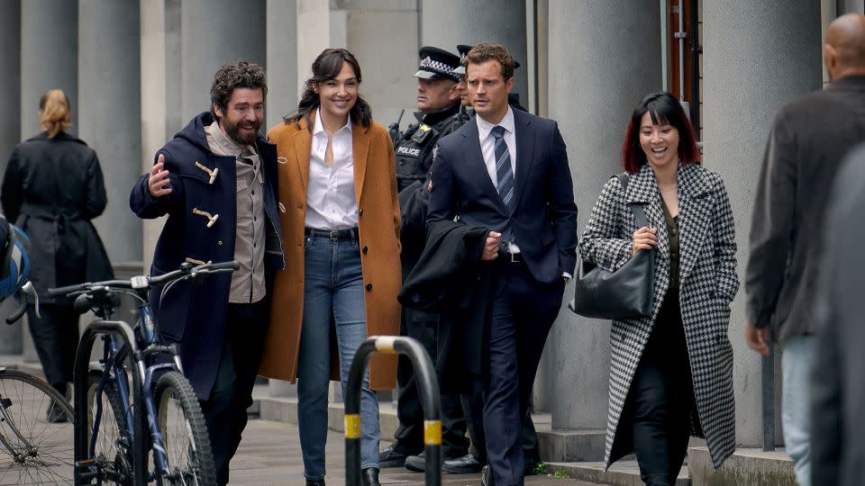 Paul Ready, Gal Gadot, Jamie Dornan and Jing Lusi in "Heart Of Stone." - Robert Viglasky/Netflix