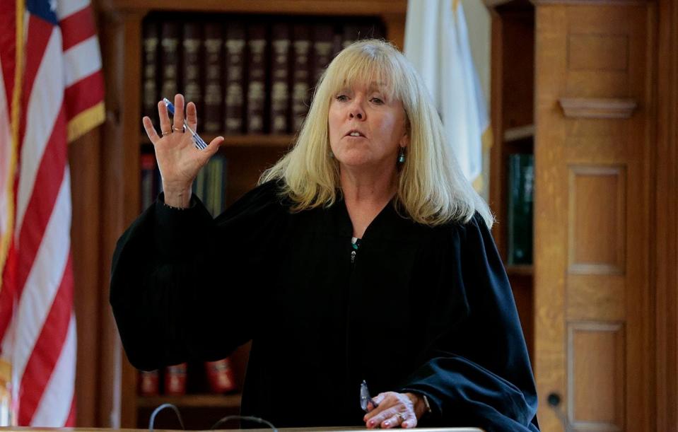 After the defense's last witness, Judge Beverly J. Cannone speaks to the jury during the murder trial for Karen Read at Norfolk Superior Court, in Dedham, Mass., Monday, June 24, 2024. Read is accused of backing her SUV into her Boston Police officer boyfriend, John O'Keefe, and leaving him to die in a blizzard in Canton, in 2022. (Pat Greenhouse/The Boston Globe via AP, Pool)