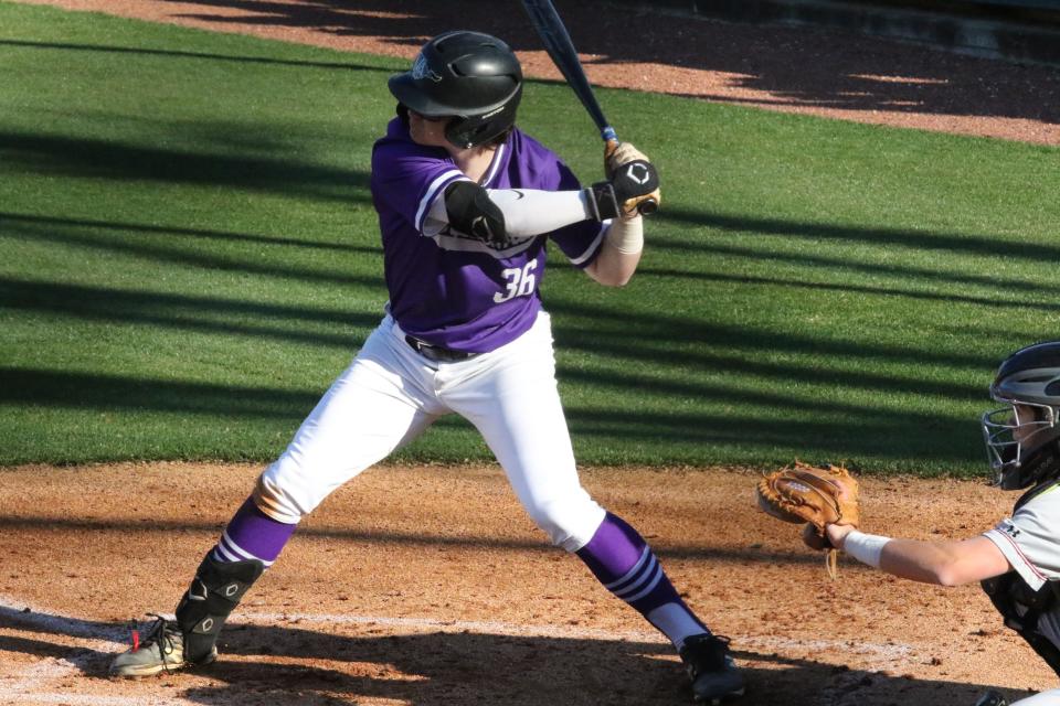 Lipscomb Academy's Hunter High prepares to take a swing at a MBA pitch moving toward home plate during their baseball game Tuesday, March, 28, 2023 in Nashville, Tennessee.