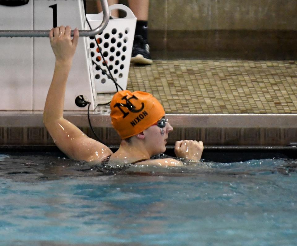Hoovers Annabelle Nixon checks the times after the girls 50-yard freestyle of the 2022 OHSAA Division I prelims in the state swim meet at C.T. Branin Natatorium, Friday,  Feb. 25, 2022.