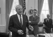 <p>Allen Dulles tells reporters in a White House news conference that he has recommended to President Johnson stepped-up FBI activity to “control and prosecute terroristic activities” in Mississippi, June 26, 1964. The former CIA director conferred with the president for almost two hours after returning from Mississippi, where three civil rights workers are missing. (Photo: Bob Schutz/AP) </p>