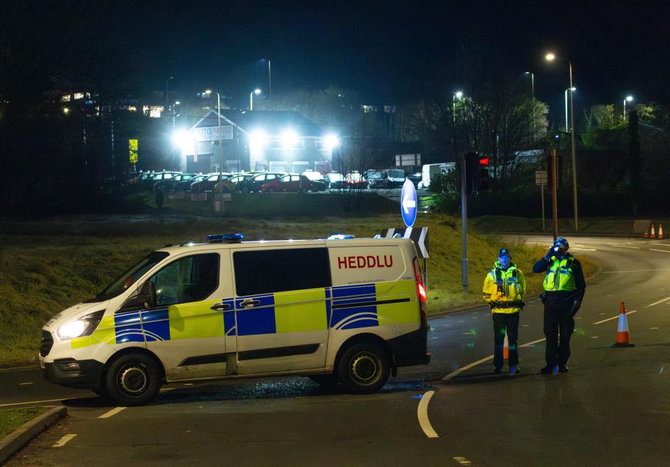 Police close roads near a fire at the Treforest Industrial Estate in Pontypridd, Wales, Britain, 14 December 2023 (EPA)